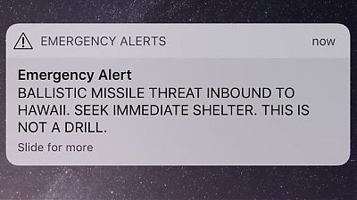 Phone screen capture of an alert message. 'Emergency alert: BALLISTIC MISSILE THREAT INBOUND TO HAWAII. SEEK IMMEDIATE SHELTER. THIS IS NOT A DRILL'